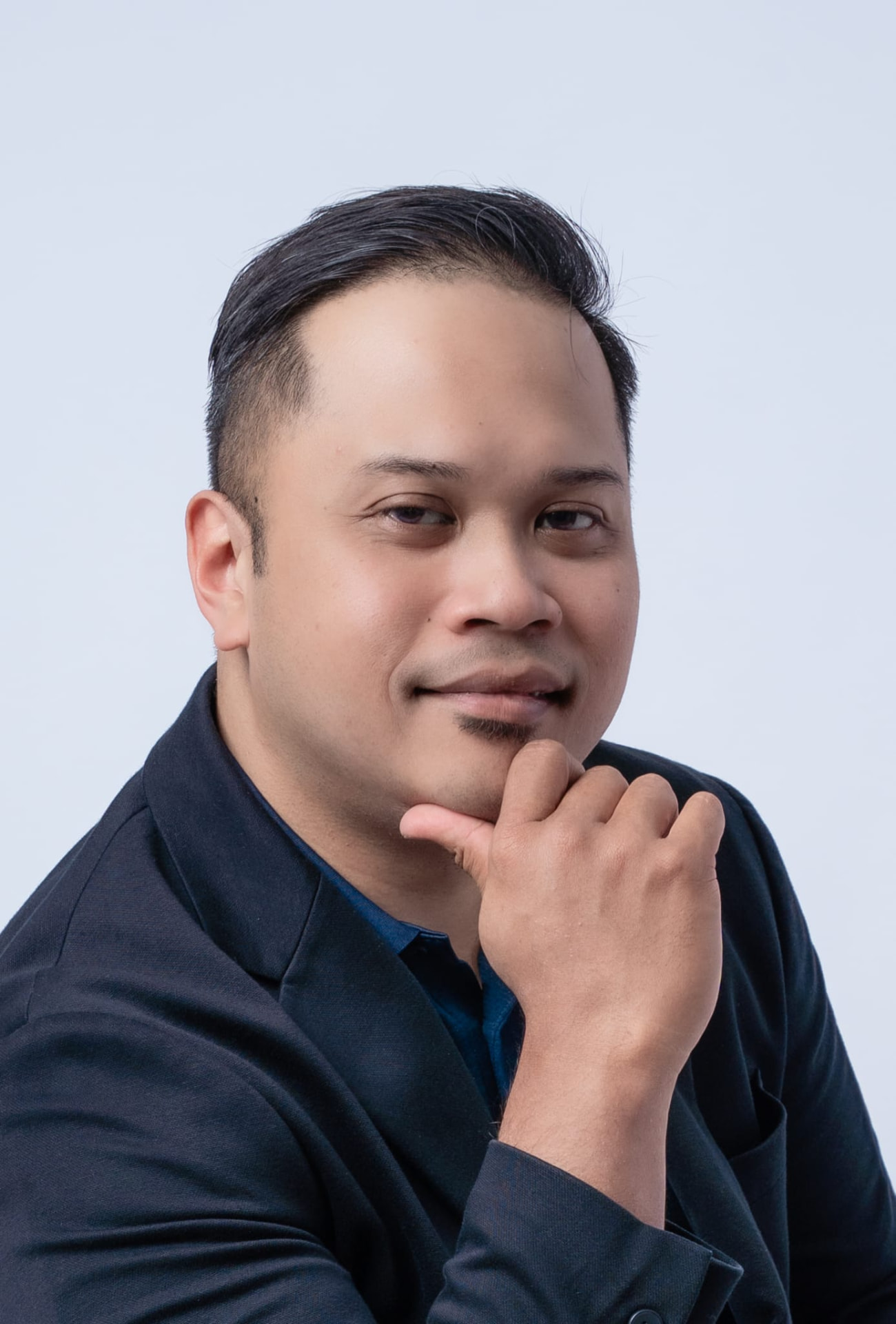Husaini Salamat, close-up portrait.